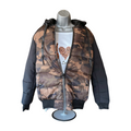 Tricolor camouflage puffer jacket with a detachable hood for women.
